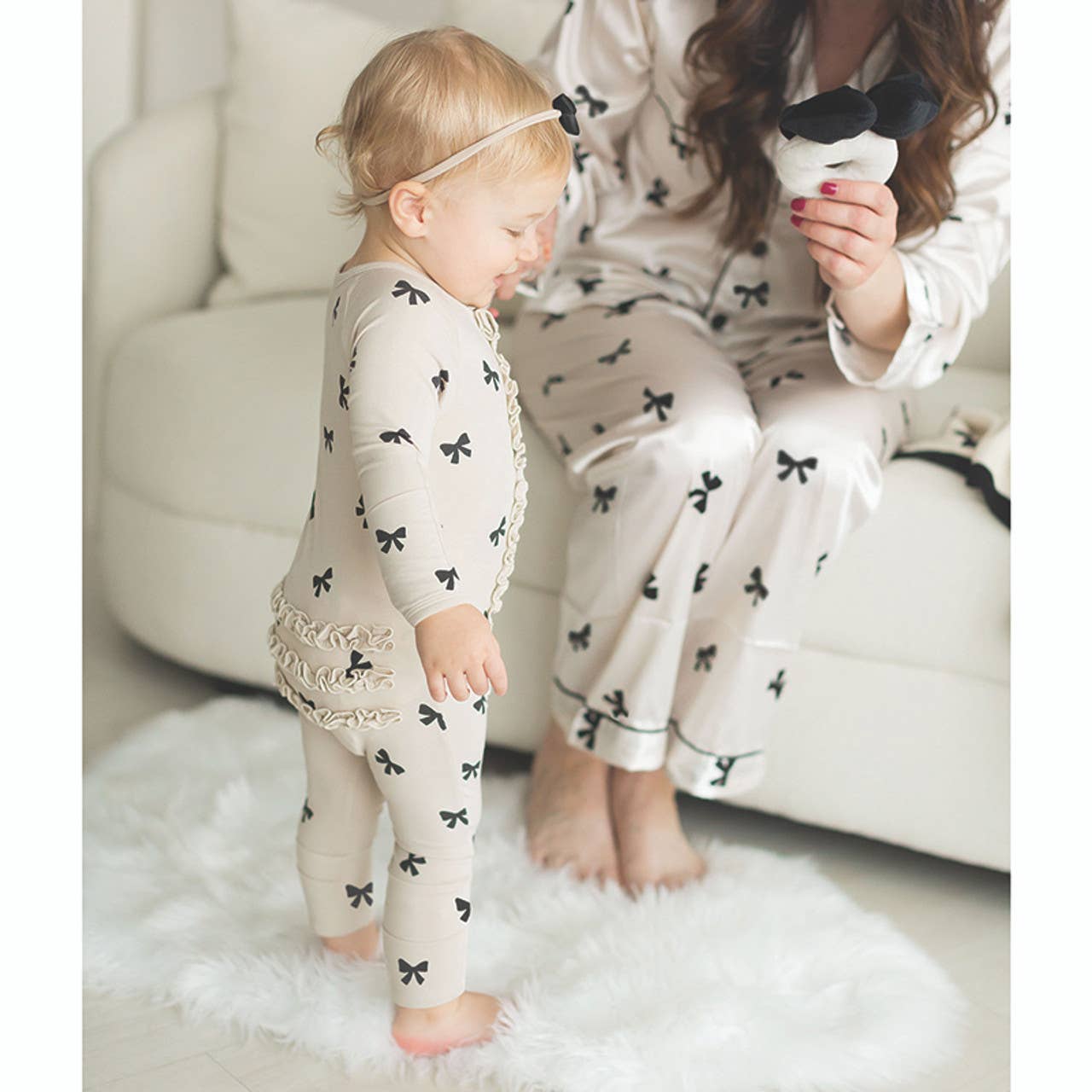 Cozy Bow Romper with Ruffles