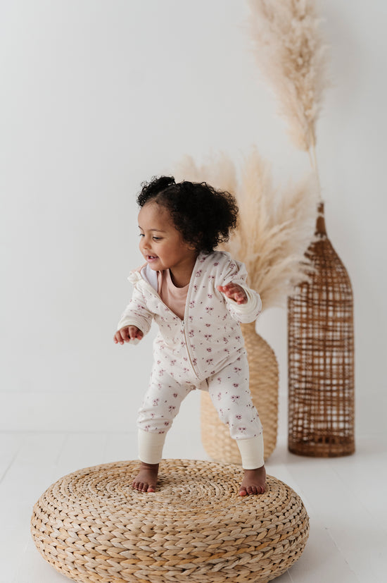 Load image into Gallery viewer, Mini Cream Floral Zip Romper
